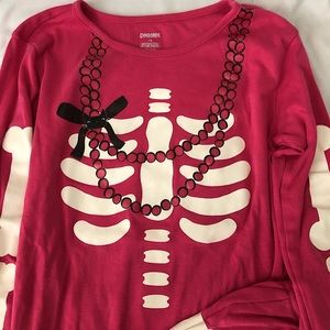 Glow in the dark skeleton pajamas, size 12